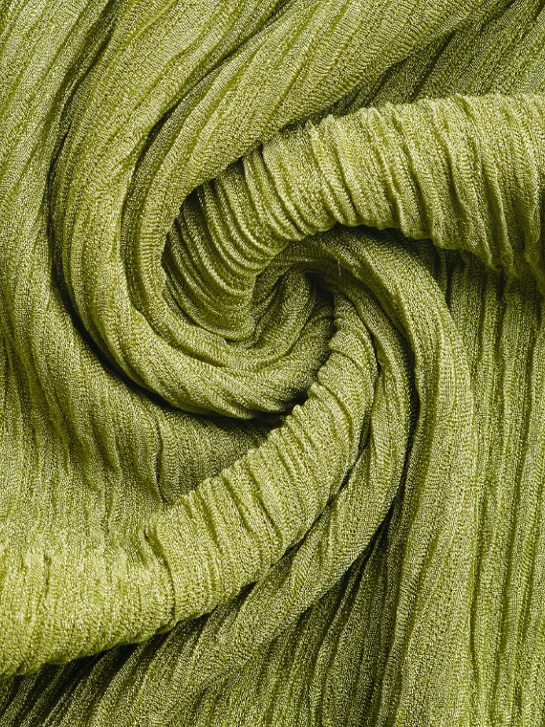Lime textured fabric with a crinkled effect, close-up detail