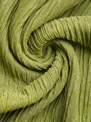 Lime textured fabric with a crinkled effect, close-up detail