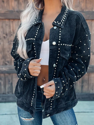 Black corduroy jacket with studded details and a collar.
