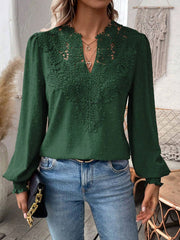 Dark Green embroidered yoke blouse with puff sleeves and textured fabric.
