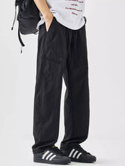Black wide-leg sweatpants with drawstring and cargo pocket detail.