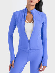 Ribbed performance zip-up track jacket in Cobalt Blue with thumbholes and a stand-up collar.