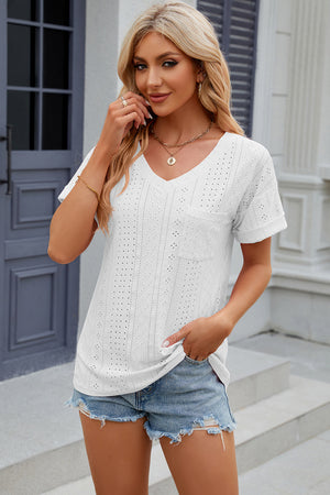 White perforated v-neck t-shirt with rolled sleeves and a chest pocket.