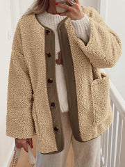 Tan teddy-texture button-up jacket with corduroy trim and button details.