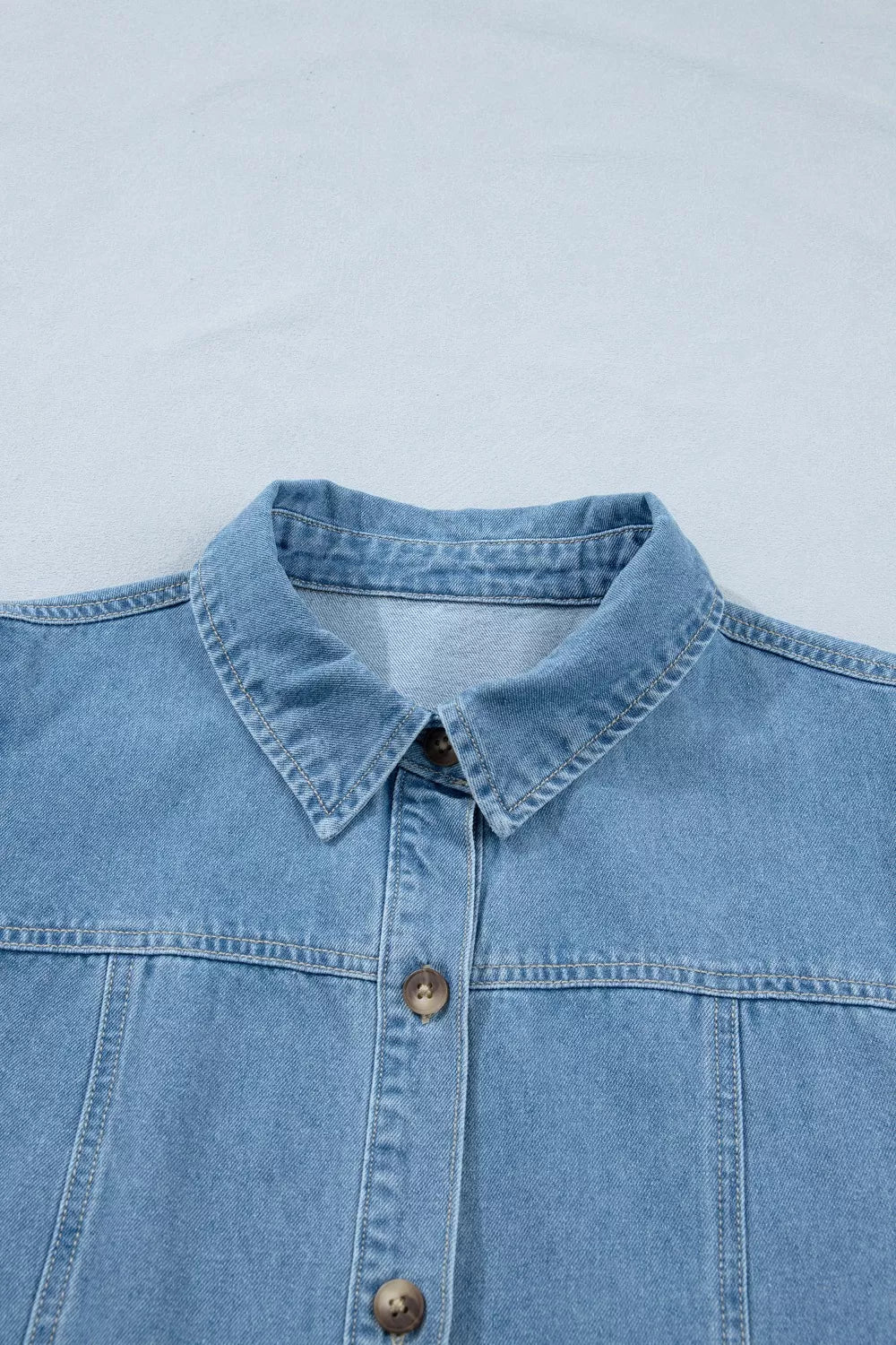 Light wash denim dress with button front and collar detail