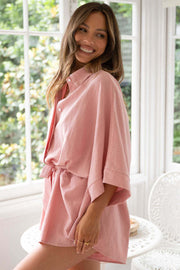 Dusty pink linen kimono sleeve romper with tie waist and collar detail