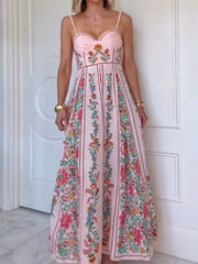 Pink sweetheart neck a-line maxi dress with floral embroidery and straps.