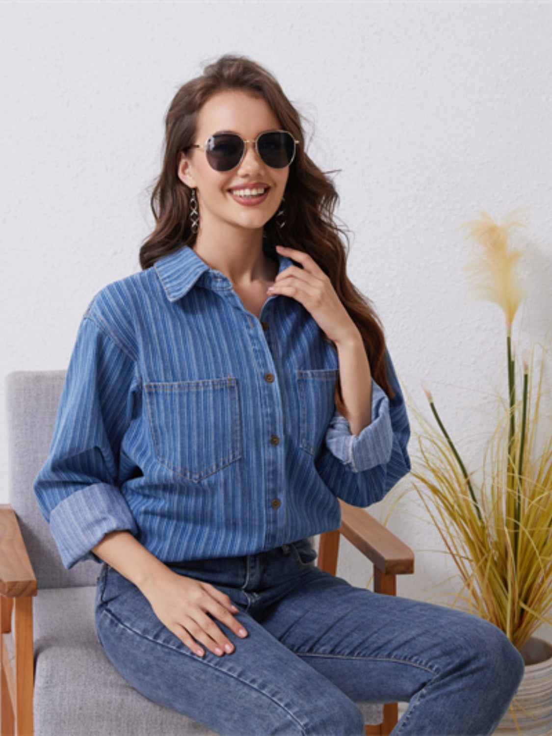 Medium vertical stripe denim overshirt with two chest pockets and button front.