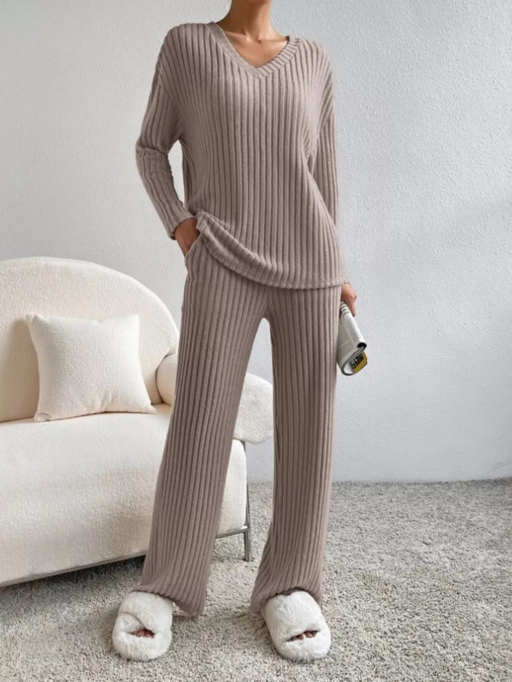 Brown ribbed knit V-neck loungewear set with long sleeves and wide-leg pants.