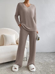Brown ribbed knit V-neck loungewear set with long sleeves and wide-leg pants.