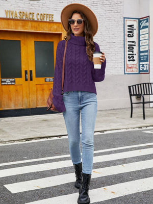 Violet cable-knit acrylic sweater with a high neck and long sleeves.