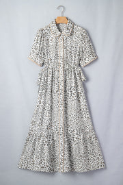 Print button-down midi dress with drawstring waist and leopard pattern.