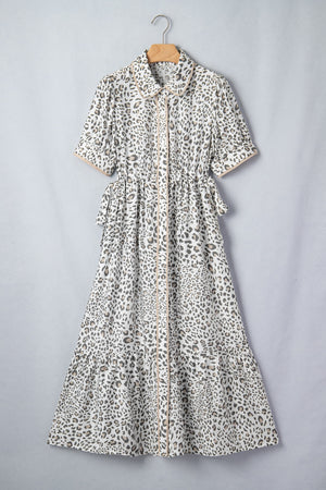 Print button-down midi dress with drawstring waist and leopard pattern.