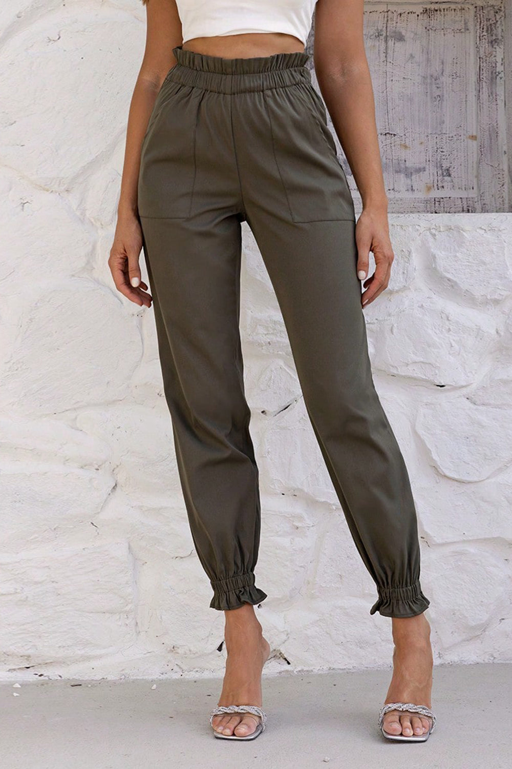 Olive brown cuffed joggers with gathered waistband and ruffled ankles.
