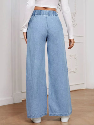 Light blue high-waisted wide leg jeans with elastic waistband and full length.
