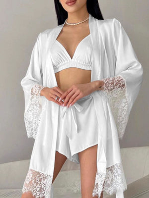 White lace trim three-piece lounge set with bralette, shorts, and robe.
