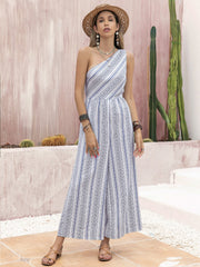 Printed asymmetric palazzo jumpsuit with one shoulder, wide leg, and blue geometric pattern on white.