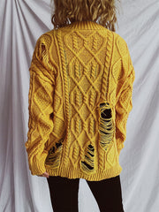 Mustard yellow distressed cable knit sweater with ripped details