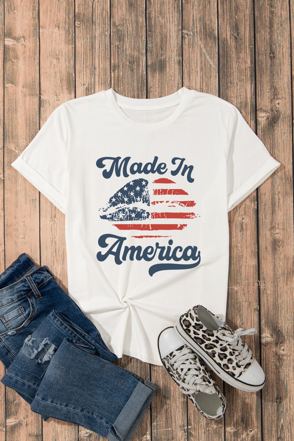 White t-shirt with distressed American flag graphic and "Made In America" text.