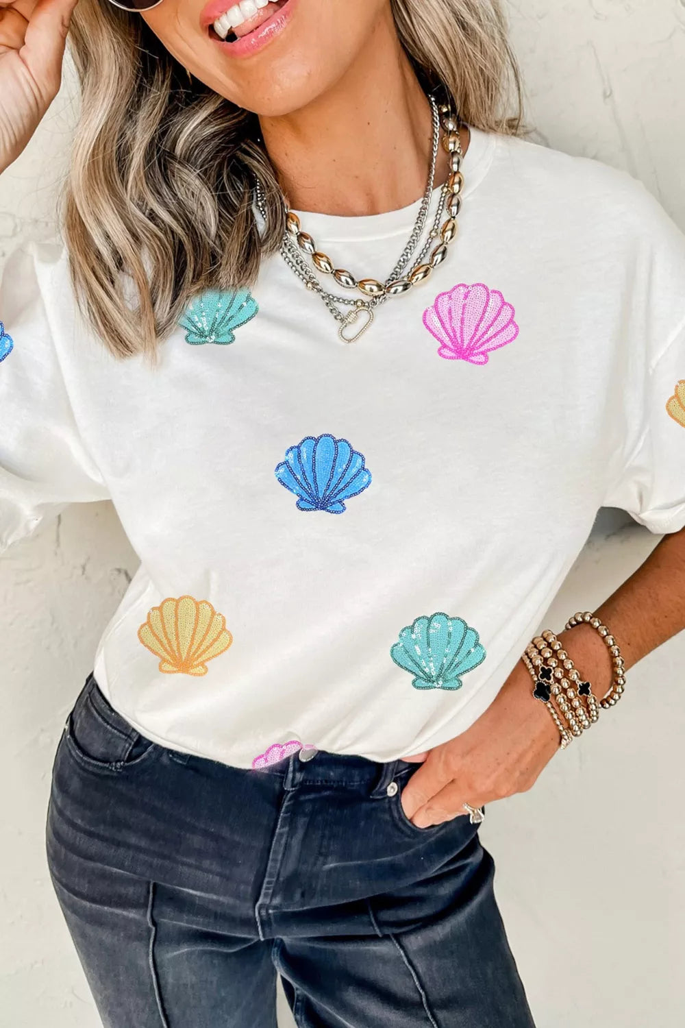 White polyester t-shirt with colorful sequin shell graphic print