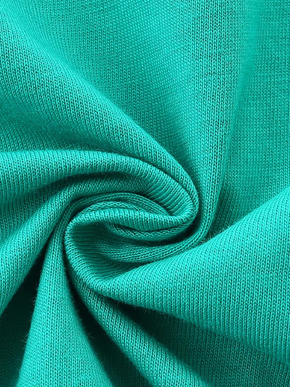 Teal cotton t-shirt fabric detail, showing knit texture.