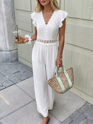 White lace-trimmed wide-leg romper with flutter sleeves and V-neck