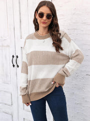 Striped knit crewneck sweater with ribbed trim in white and khaki acrylic.