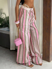 Wide leg pants with pink, green, and white stripes and a drawstring waist.