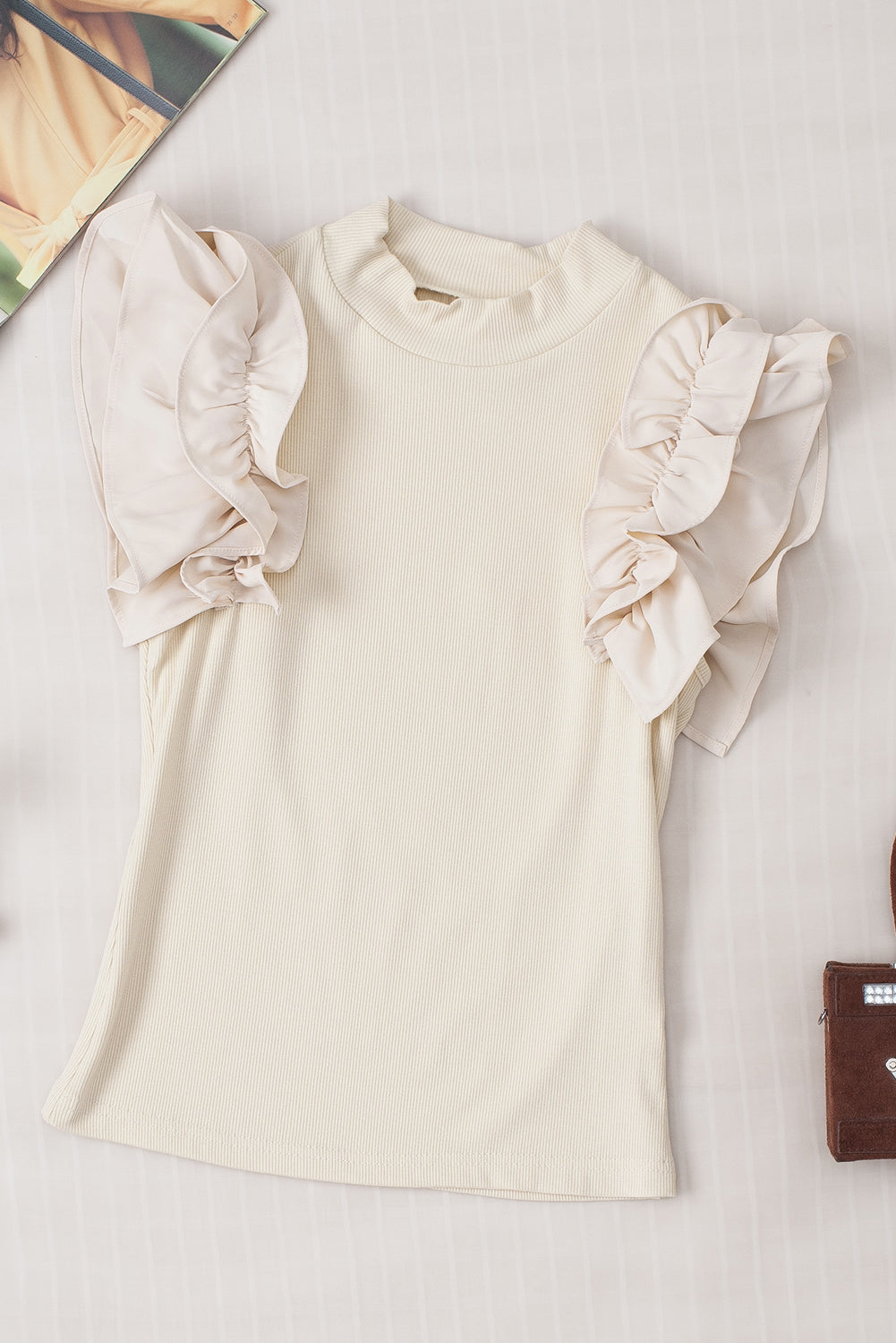 Beige ribbed mock neck top with ruffled short sleeves