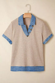 Ribbed knit tunic top in beige with a denim collar, button placket, sleeve cuffs, and hem.