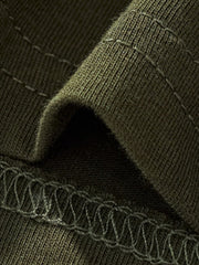 Toddler green crew neck t-shirt fabric detail with visible stitching.
