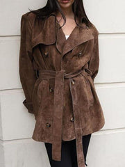 Elegant dark brown belted double-breasted trench coat with cuffed sleeves and a tie waist.