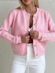 Blush pink textured knit cardigan with elegant gold button detail and crew neck.