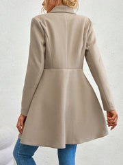 Dust Storm draped collar coat with a flared hem and button detail.