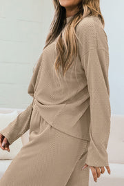 Khaki textured knit loungewear set with long sleeves and a draped detail.