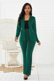 Emerald green flare leg pant suit with a classic blazer and matching trousers.