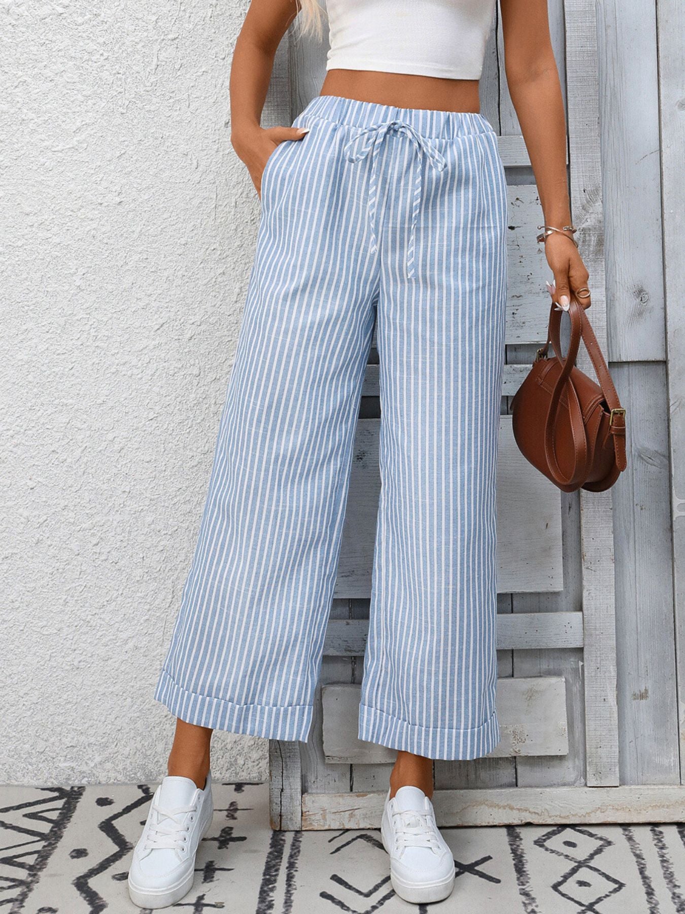 Light blue and white striped drawstring wide leg pants with pockets
