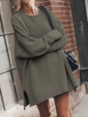Oversized open-knit sweater dress in army green with crew neck and side slits.
