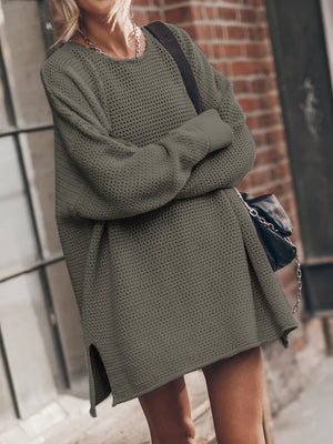 Oversized open-knit sweater dress in army green with crew neck and side slits.