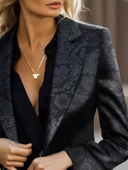 Black lapel collar blazer with tonal floral pattern, slim fit, and button detail.