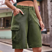 Army green denim cargo shorts with multiple pockets and a relaxed fit.