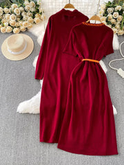 Burgundy knitted maxi dress and cardigan set with orange belt detail