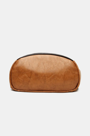 Caramel leather convertible backpack with black trim detail