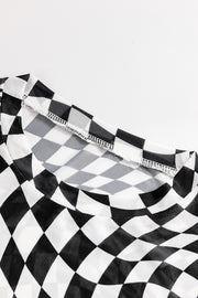 Black and white checkered mesh blouse with a crew neck and visible stitching detail.