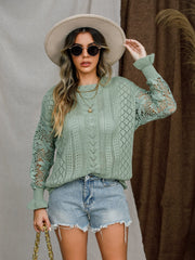 Light green openwork sleeve knit sweater with diamond pattern and cable knit detail.