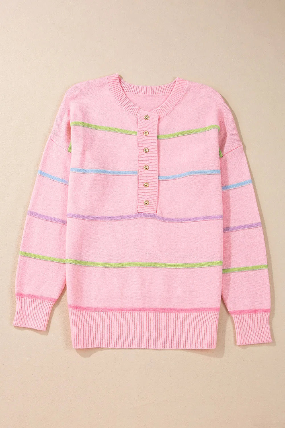 Pink striped knit henley sweater with button detail and pastel stripes