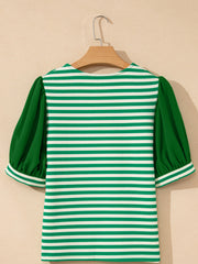 Green and white striped sweater with puff sleeves and V-neck.