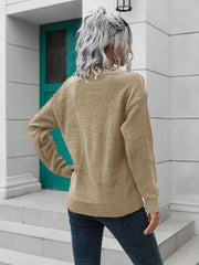 Khaki acrylic knit sweater with crew neck and long sleeves, featuring a keyhole detail at the back.