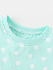 Baby dress with white polka dots on a mint green cotton blend fabric, crew neck.