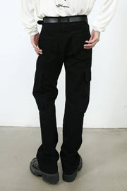 Black denim utility trousers with cargo pockets and a relaxed fit.